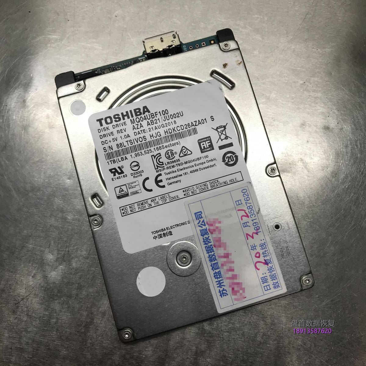 TOSHIBA MQ04UBF100东芝移动硬盘磁头异响开盘数据恢复