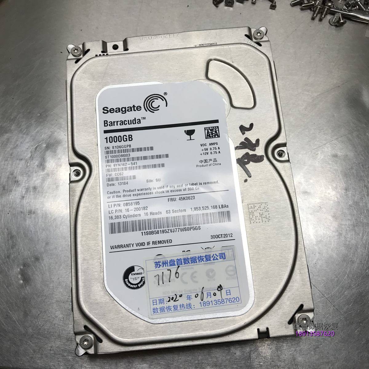 Seagate 1TB台式机硬盘通电磁头异响两声后停转更换磁头恢复数据成功