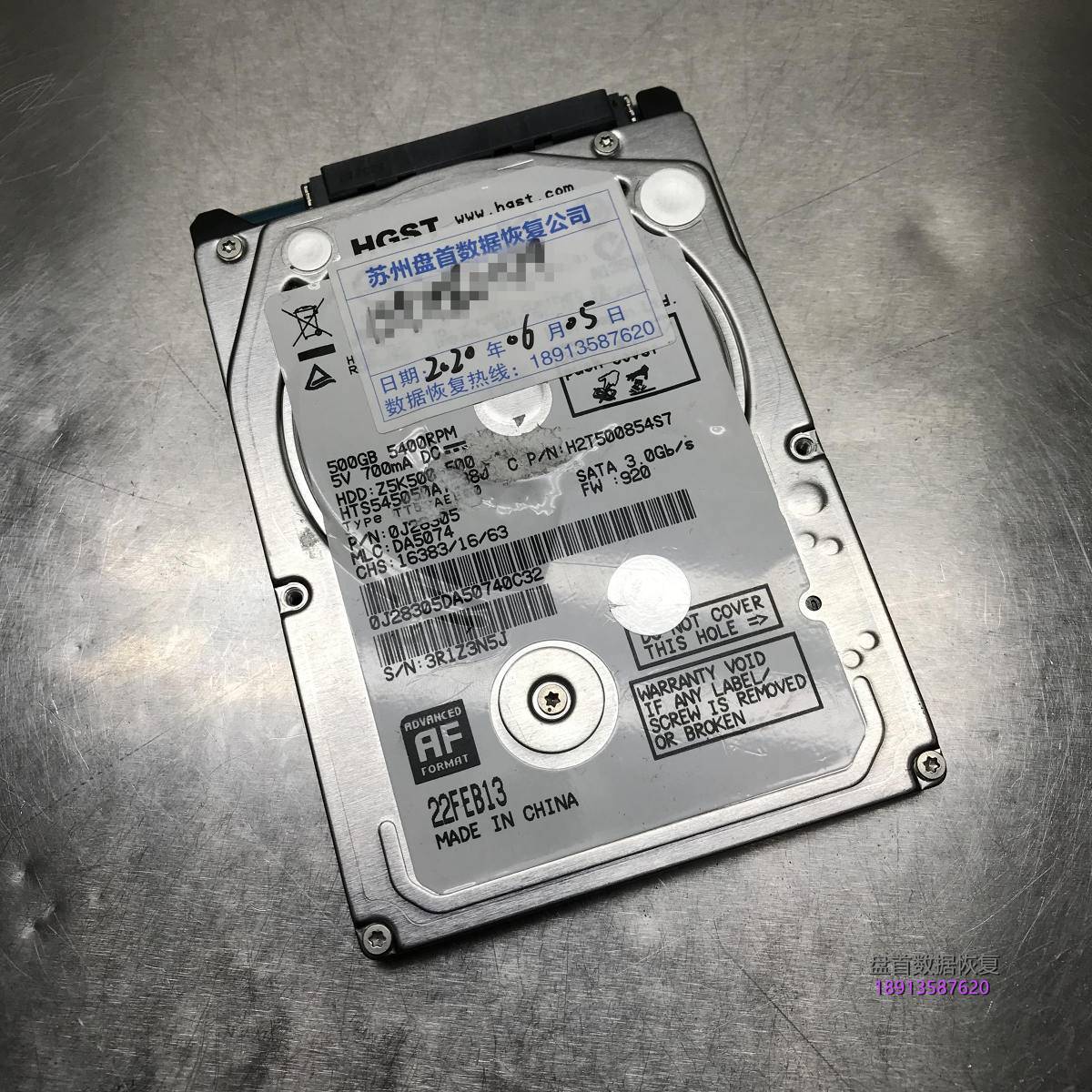 HGST日立500G笔记本硬盘磁头敲盘异响开盘数据恢复成功