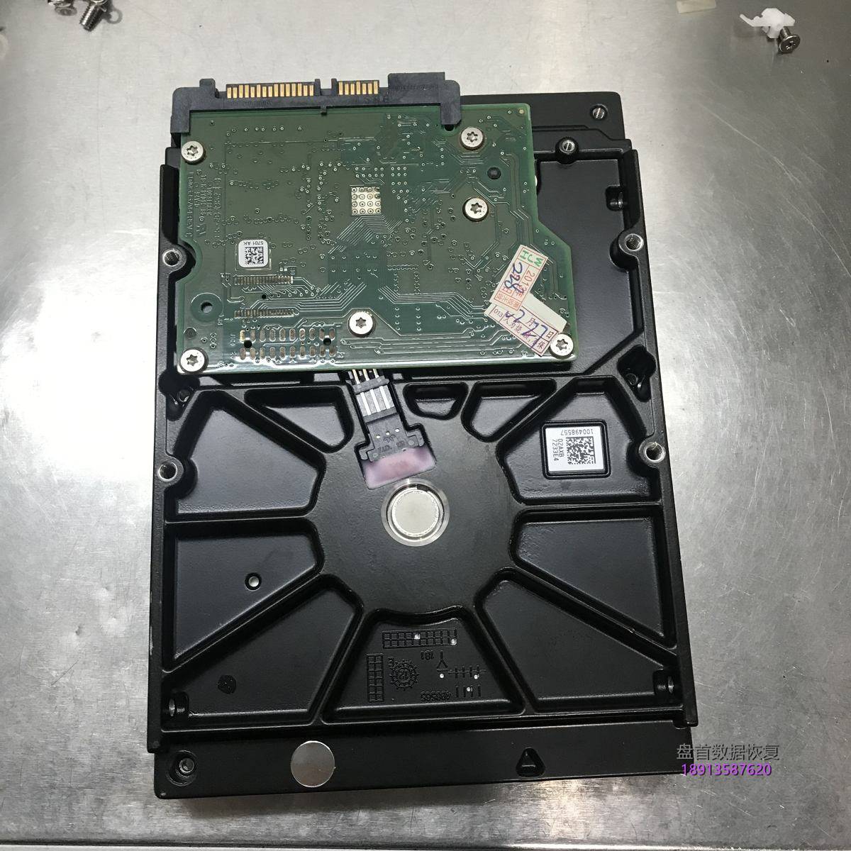 希捷ST500DM002磁头异响损坏敲11声停转,开盘数据恢复成功