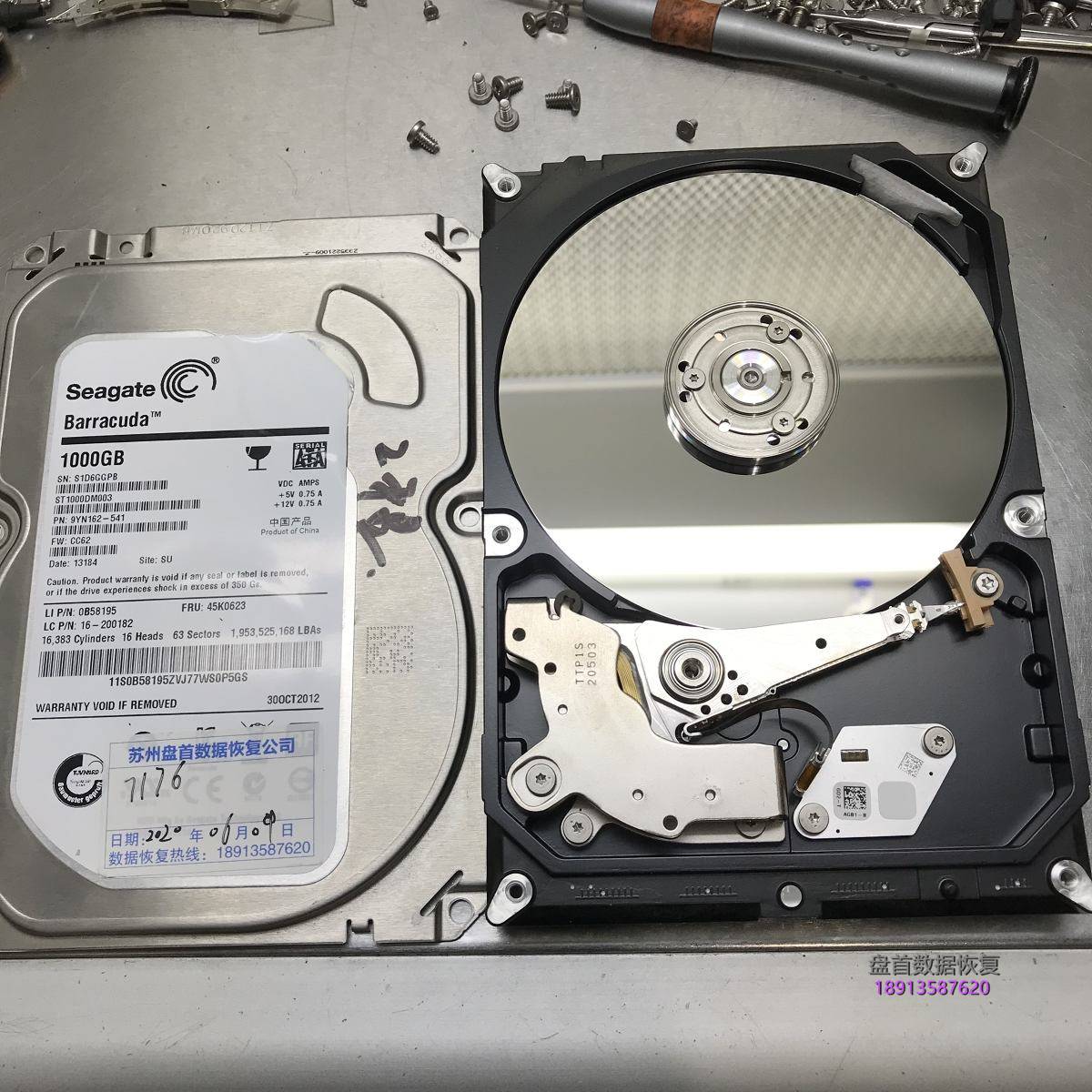 Seagate 1TB台式机硬盘通电磁头异响两声后停转更换磁头恢复数据成功