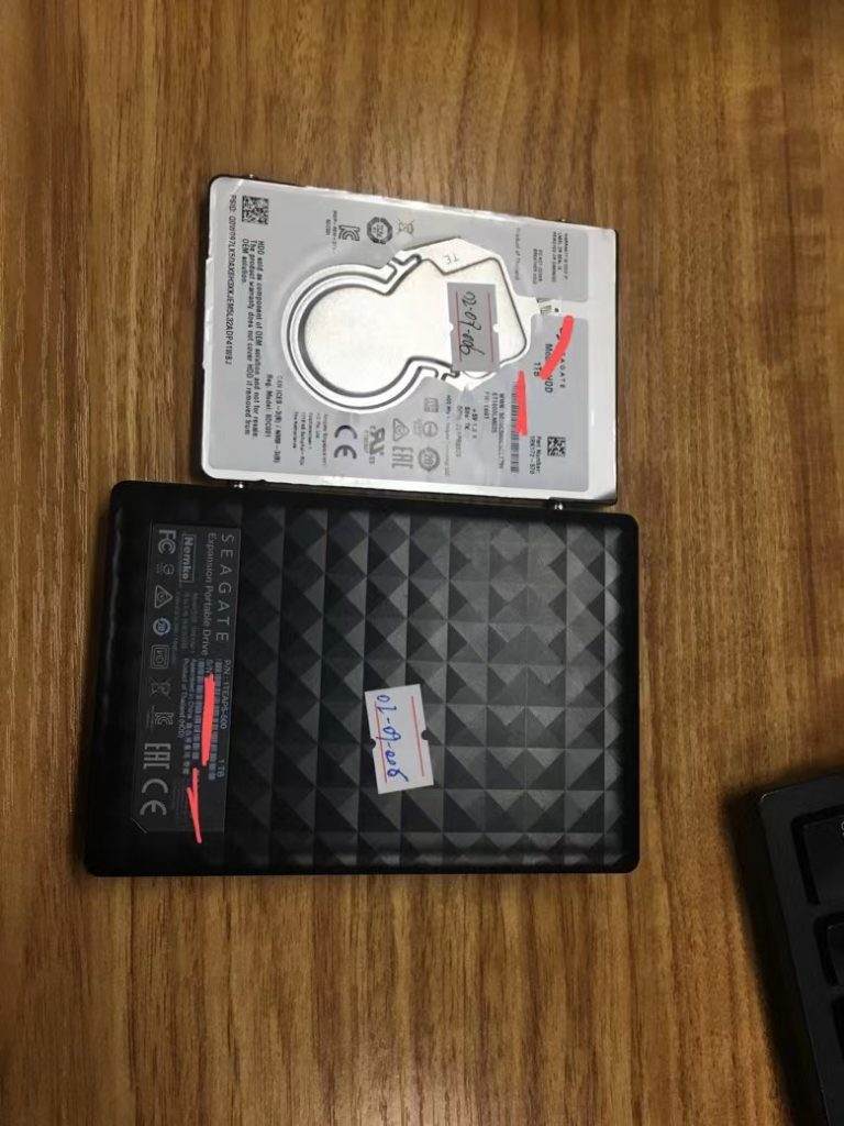 希捷1TB移动硬盘磁头损坏开盘数据恢复成功案例