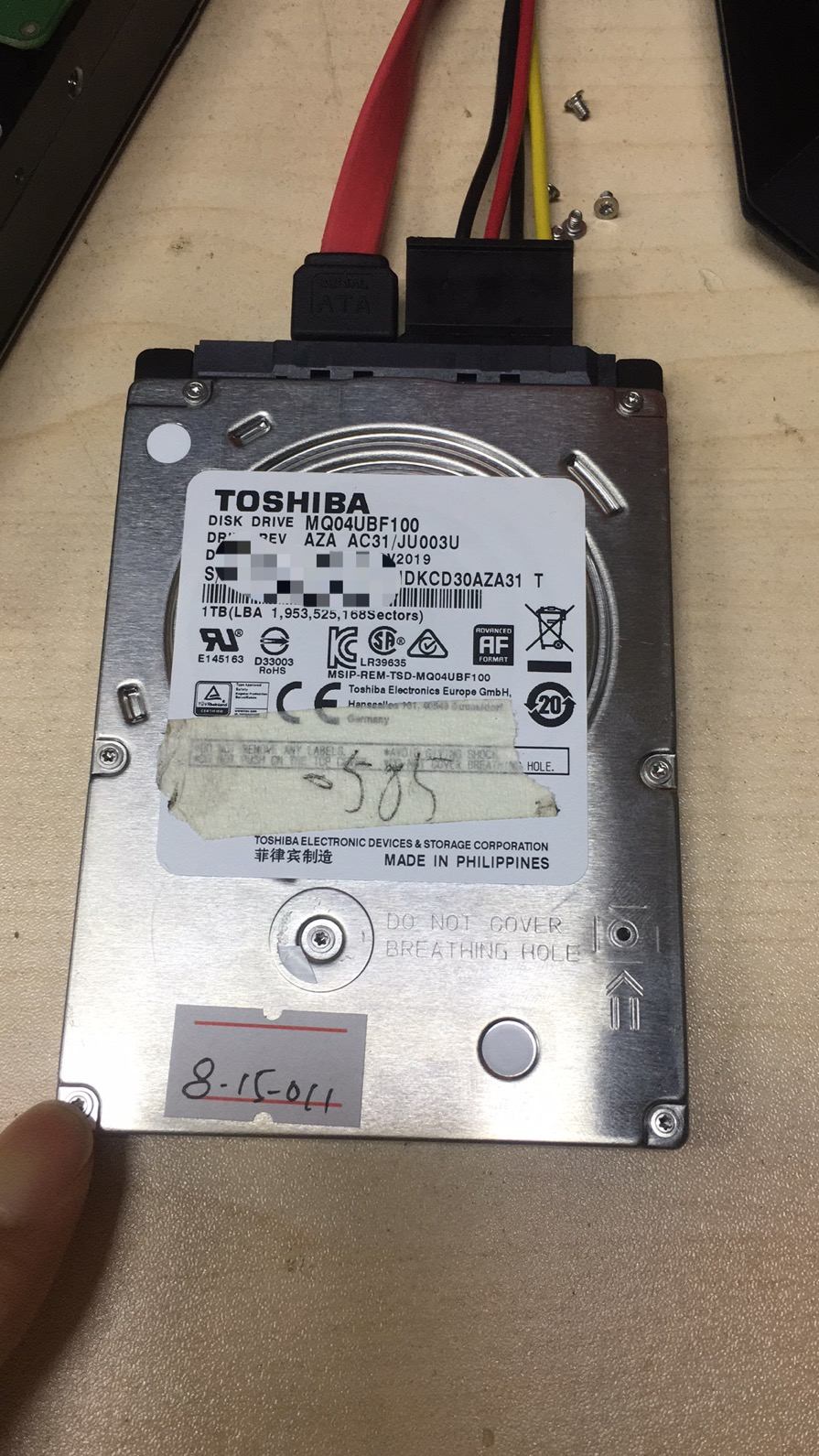 上海客户寄修一块东芝1T移动硬盘MQ04UBF100需要二次开盘恢复数据