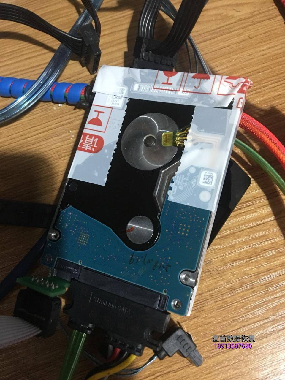 希捷2tb移动硬盘st2000lm007二次开盘数据恢复成功 2TB希捷移动硬盘ST2000LM007二次开盘数据恢复成功