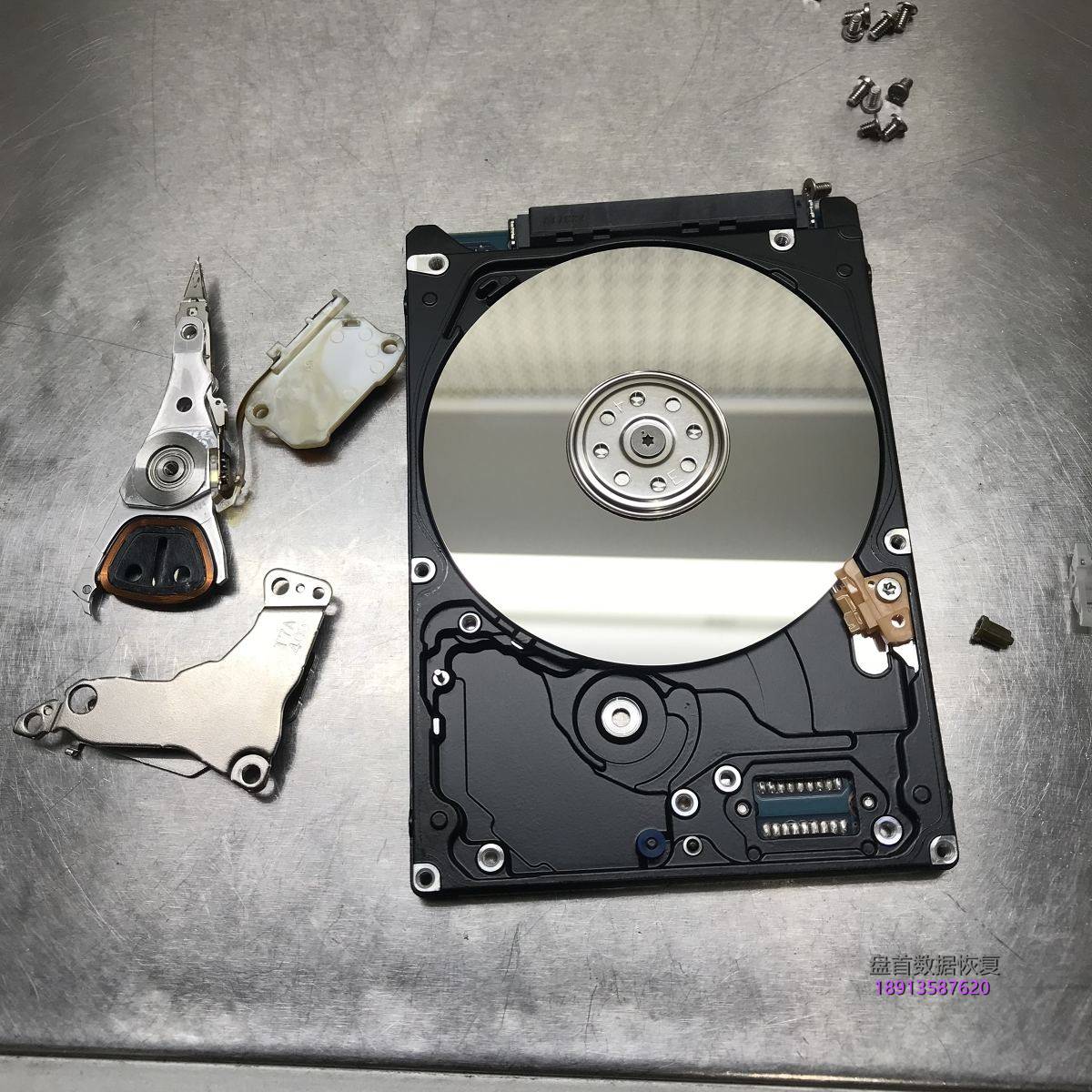 HGST日立500G笔记本硬盘磁头敲盘异响开盘数据恢复成功