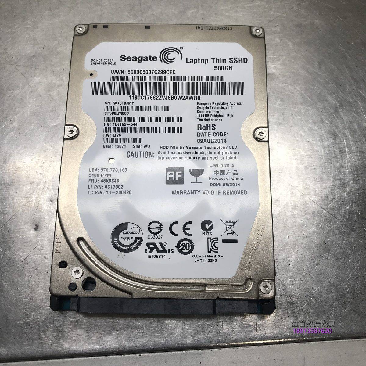 希捷Seagate 500G笔记本SSHD硬盘磁头卡死盘片导致电机无法启转开盘数据恢复成功
