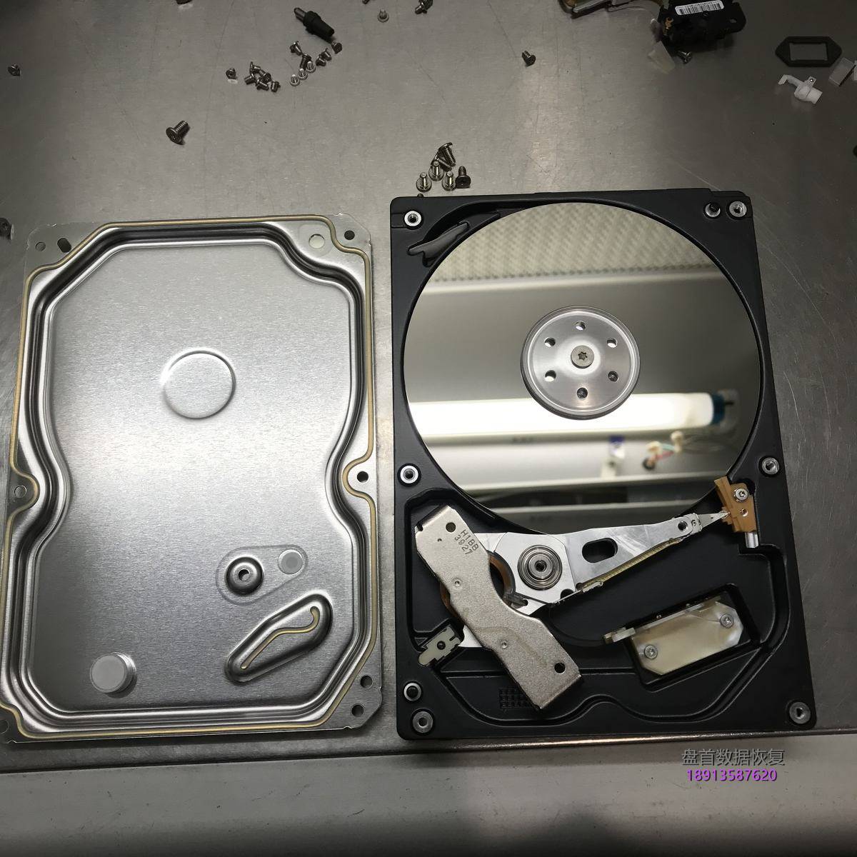 TOSHIBA DT01ACA100通电异响磁头损坏无法识别开盘数据恢复成功