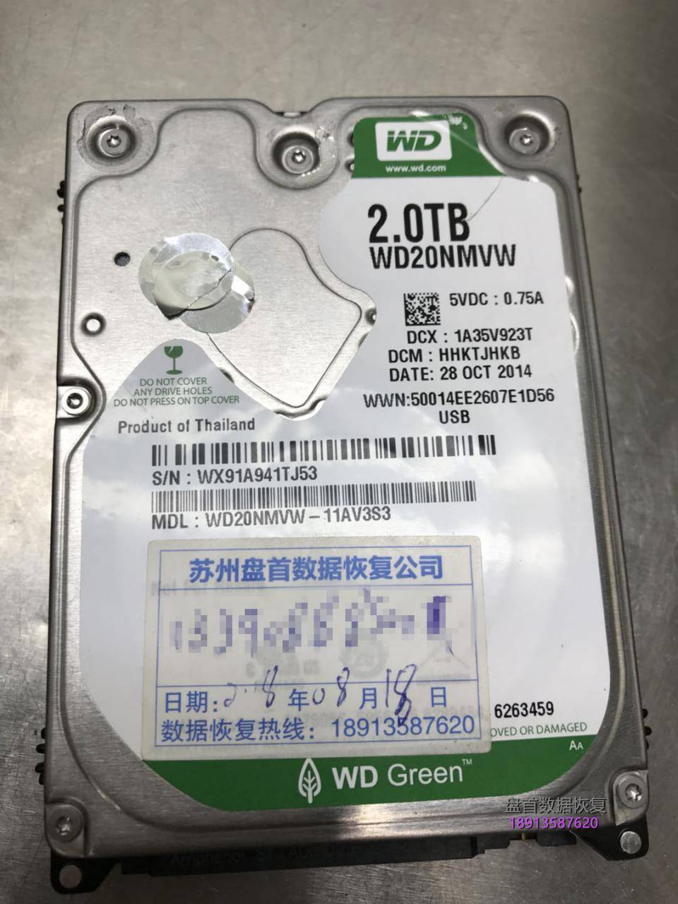 西数My passport 2TB移动硬盘WD20NMVW-11AV3S3磁头损坏划伤盘片数据恢复成功