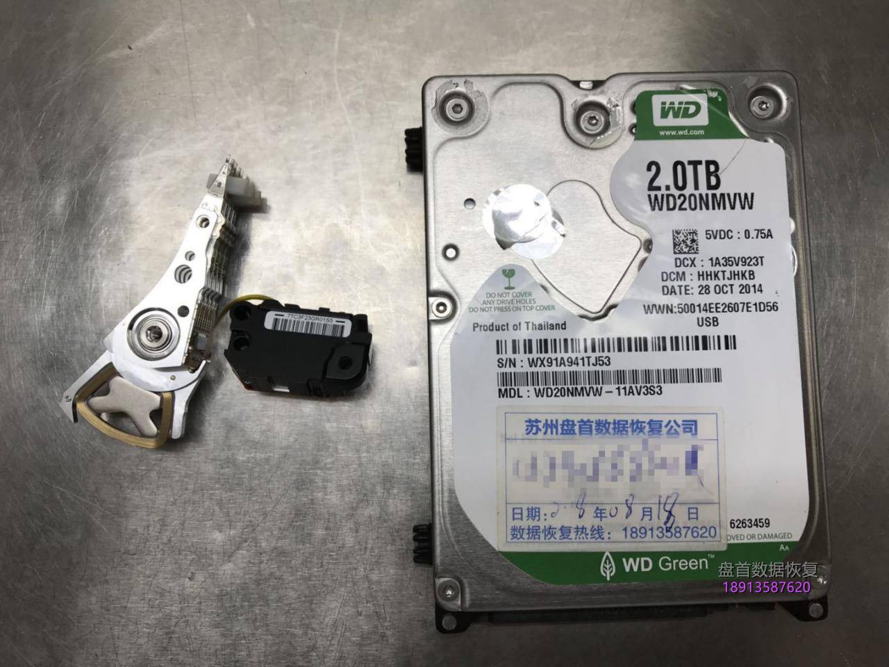 西数My passport 2TB移动硬盘WD20NMVW-11AV3S3磁头损坏划伤盘片数据恢复成功