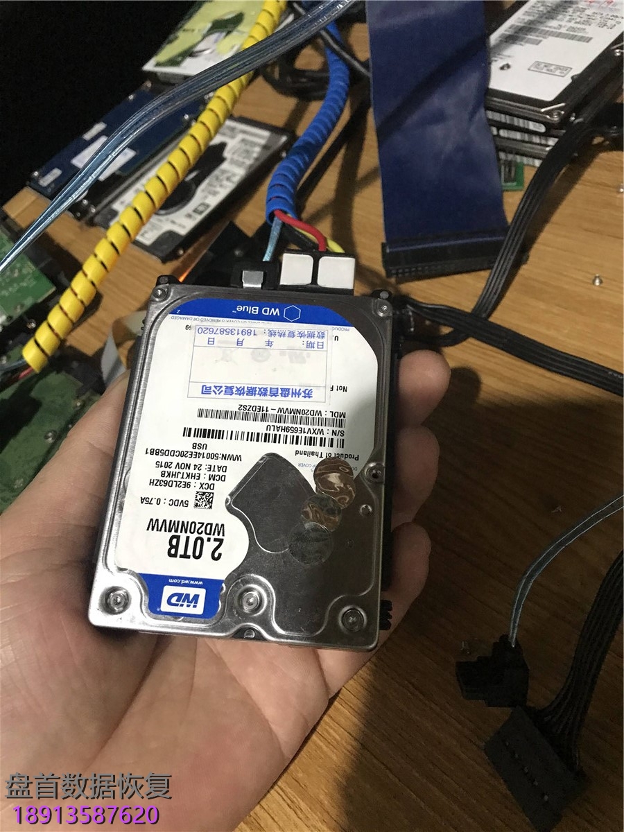 WD20NMVW移动硬盘盘片划伤数据恢复成功