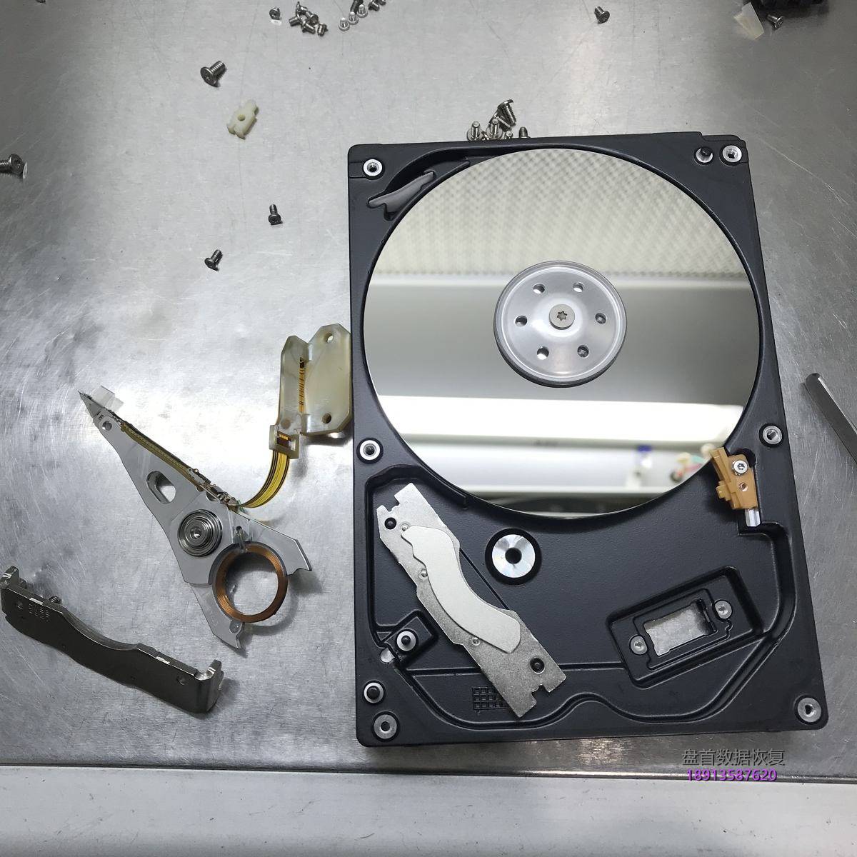 TOSHIBA DT01ACA100通电异响磁头损坏无法识别开盘数据恢复成功